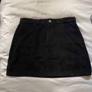 Black corduroy mini skirt